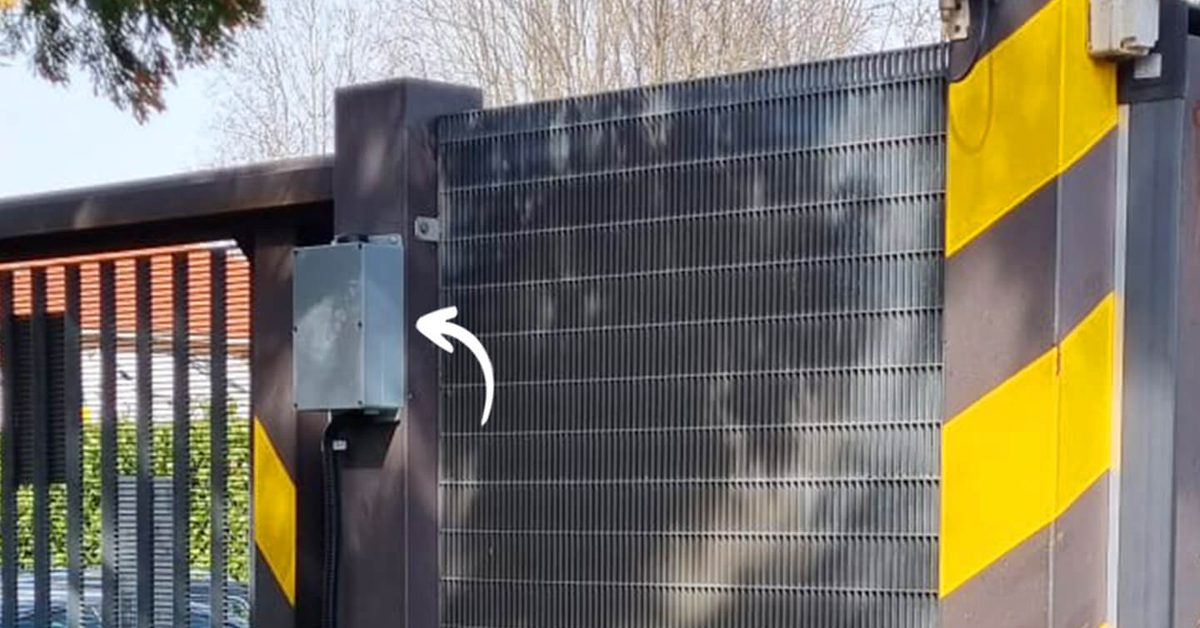 1Control ACCESS control unit mounted on the post of an existing vehicle gate, an example of retrofit access control